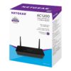 NETGEAR R6220 AC1200 dual-band Gigabit Wi-Fi router shown with retail packaging