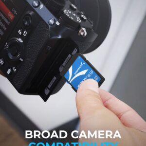 Sabrent Rocket V60 512GB SD card being handled beside a camera