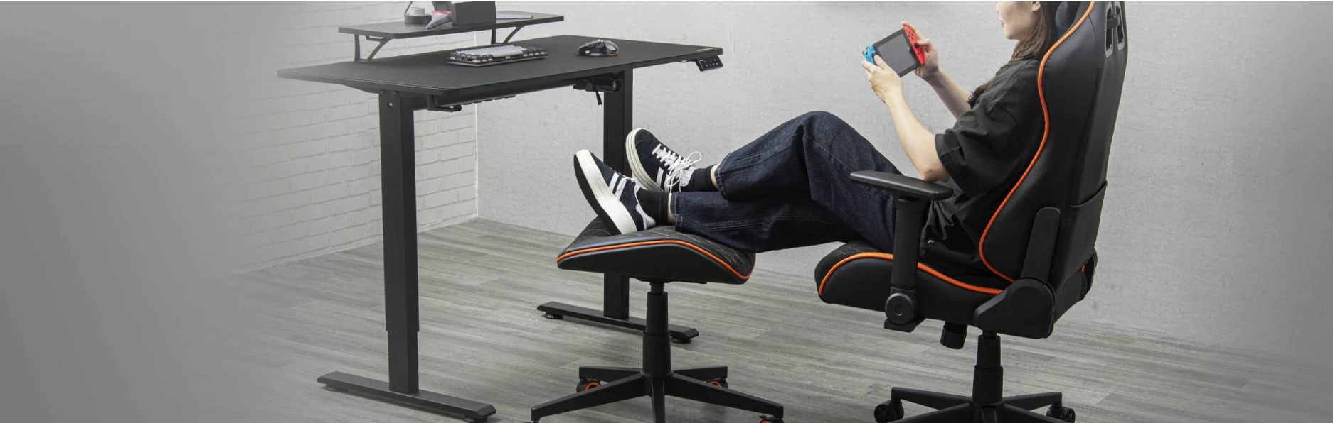 COUGAR Crosser gaming stool as footrest with standing desk ergonomic setup