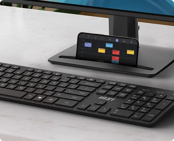 Clean desk setup featuring MSI PRO business monitor with slim bezels